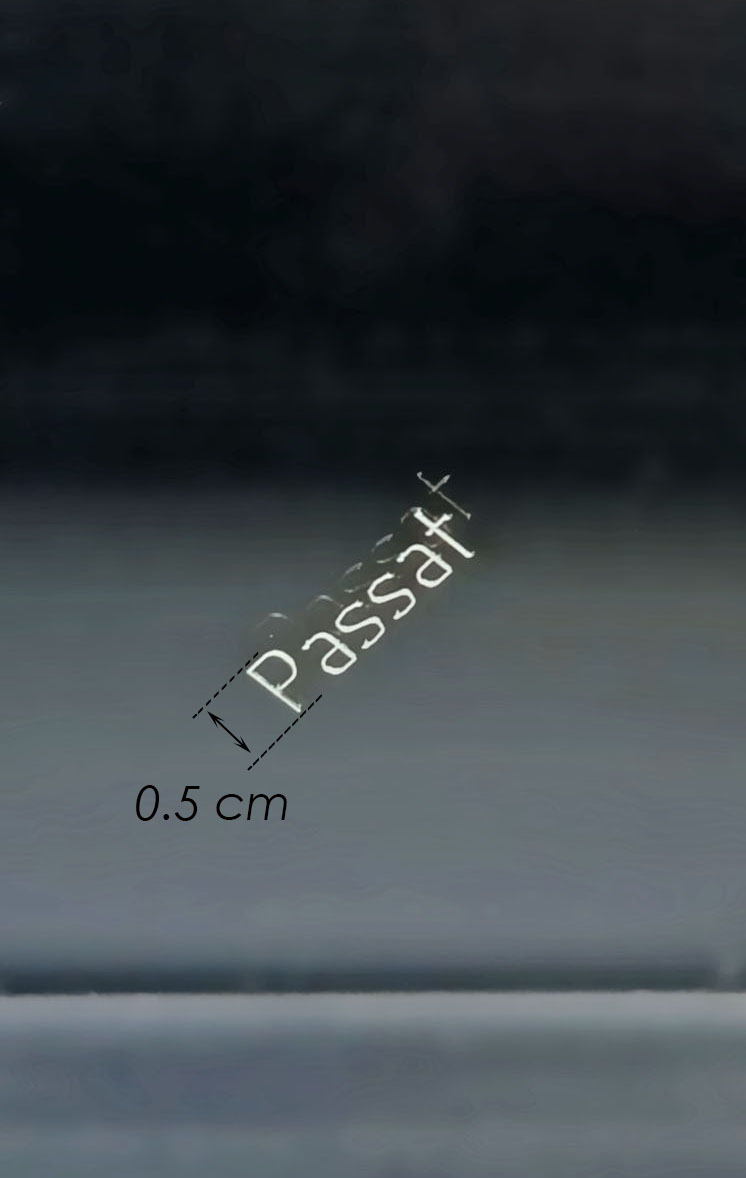 Passat text micro-engraved on glass